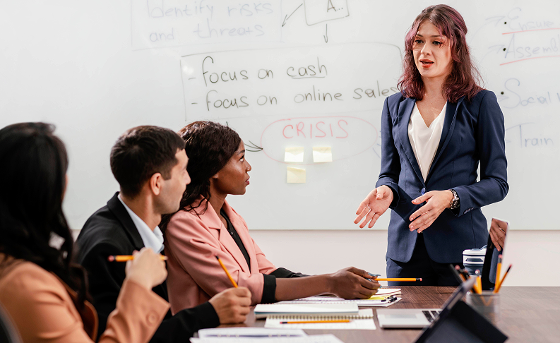 Institution team reviewing graduate outcomes